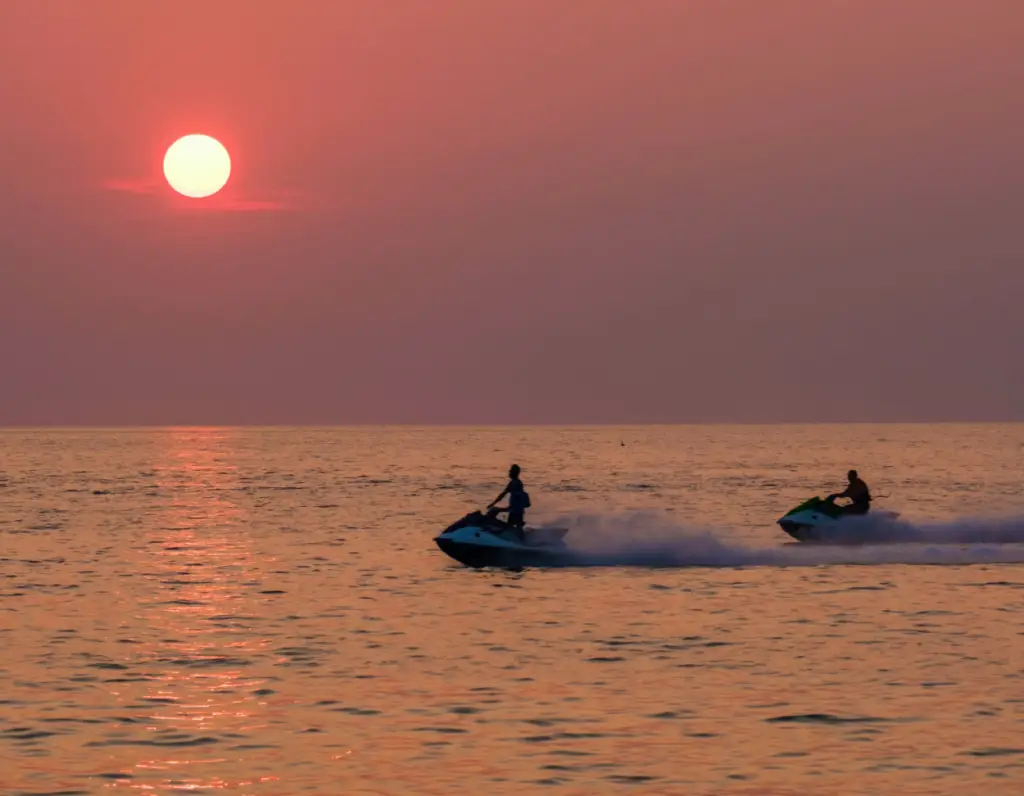 Recreational vehicles including RVs and boats representing specialized insurance coverage for leisure and travel